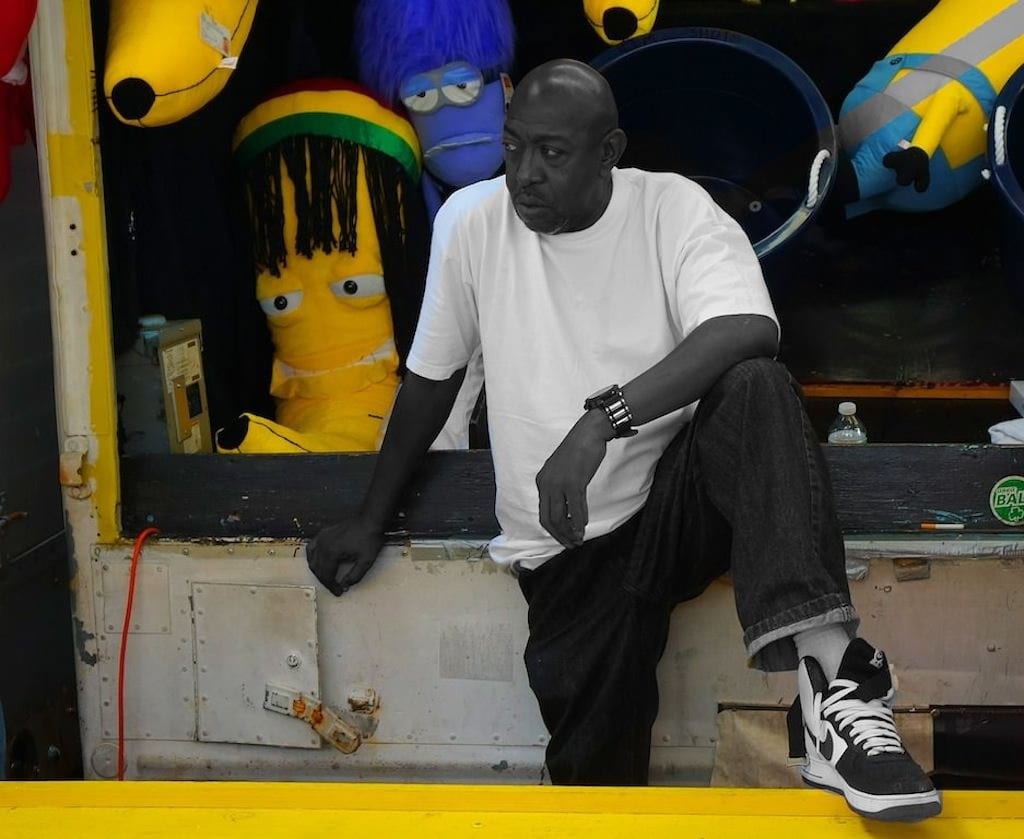 Man sitting at stall