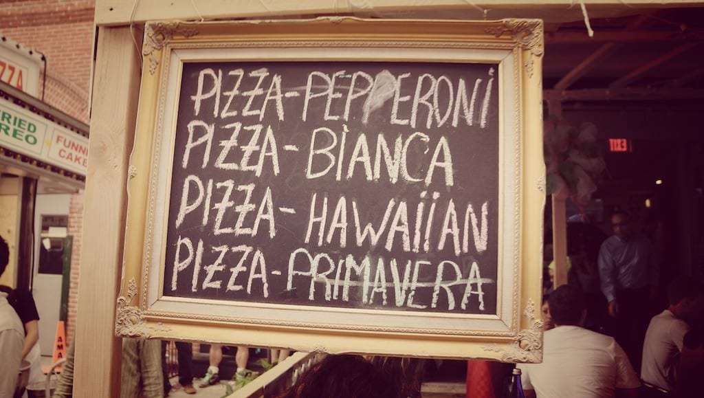 Pizza menu on chalkboard