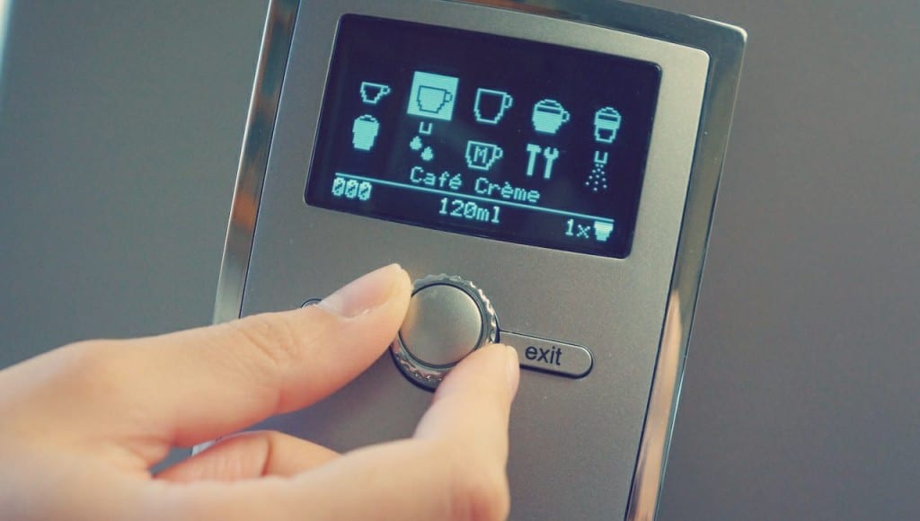 Cletus quickly realized that the dial in the middle controls the entire machine. Turn it right to light up the next icon in the row. Cletus said he wanted a Cafe Creme.