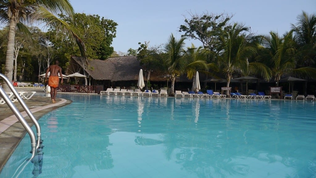 Sunlit hotel swimming pool